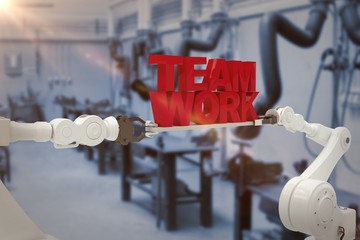 Poster - Composite image of white robotic hand holding team work text