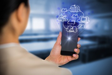 Poster - Composite image of businesswoman using mobile phone