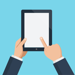 Finger touching blank screen of vertical tablet computer