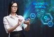 © photon_photo - The concept of business, technology, the Internet and the network. A young entrepreneur working on a virtual screen of the future and sees the inscription: Business model
