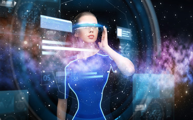 Wall Mural - woman in virtual reality 3d glasses with charts