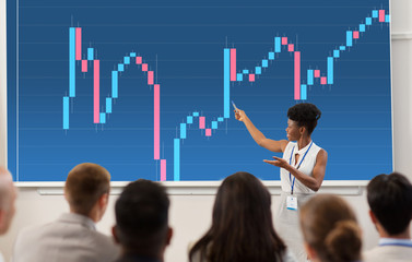 group of people at business conference or lecture