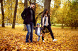 © serge - happy family in autumn city park