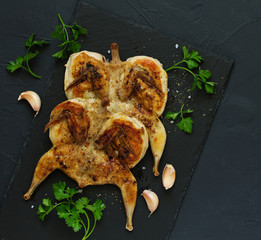 Canvas Print - fried quail (tapaka). View from above.