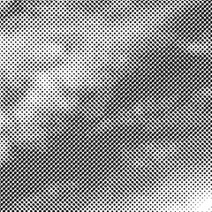 Fototapete - Vector abstract dotted background. Black and white halftone effect vector illustration.