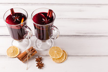 Winter Horizontal Mulled Wine Banner. Glasses With Hot Red Wine And Spices, Tree, Felt Decorations On Wooden Background.
