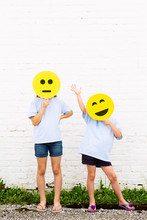 Two Girls With Emoji Faces