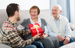 © JackF - Son gives gift to parents