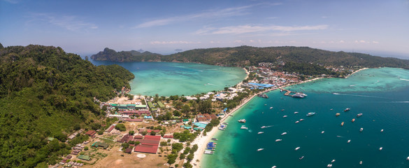 tourist boats in ton sai bay, phi phi islands, thailand, aerial panorama shot