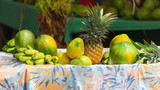 Exotic fruits sold on the road, market stall, street hawker in French Polynesia, Moorea 
