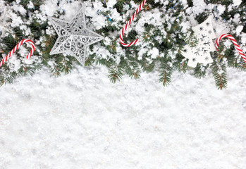 Christmas Background with Candy Canes, Ornaments and Snow Flakes