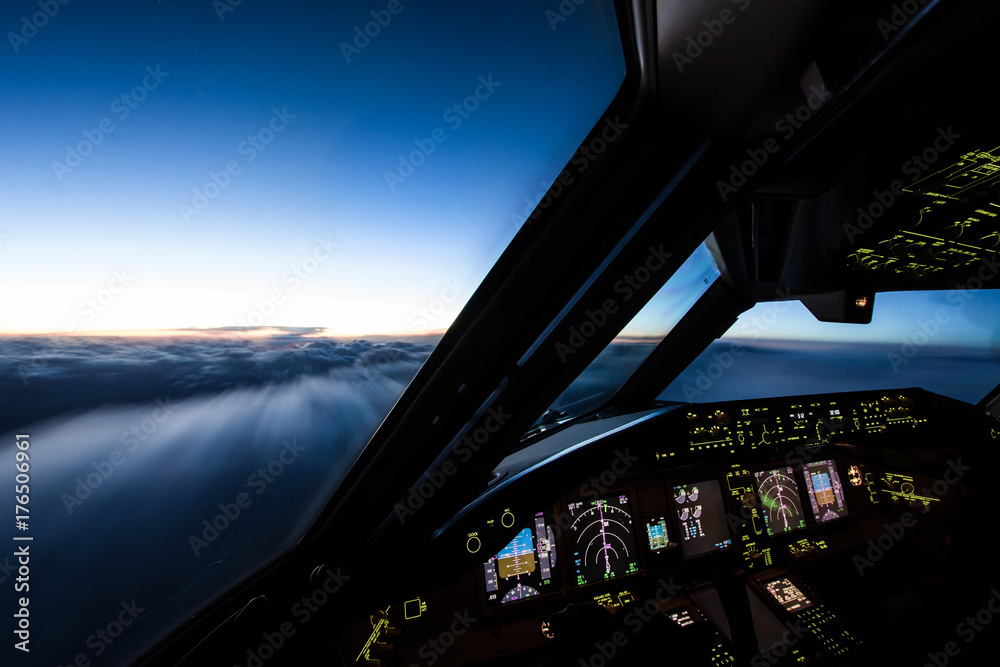 Airliner Cockpit in Flight  - obrazy, fototapety, plakaty 