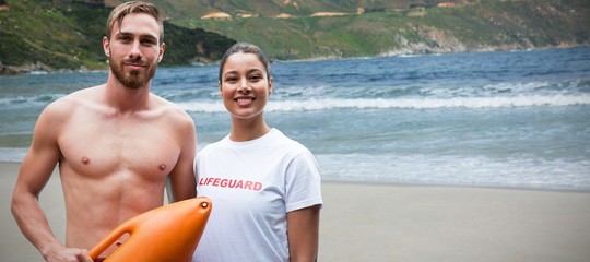 Poster - Composite image of portrait of confident lifeguards