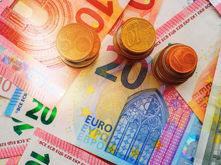 Money euro coins and banknotes, money background