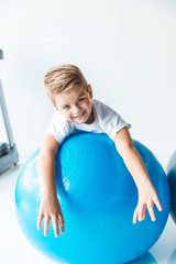 Wall Mural - little boy on fitness ball