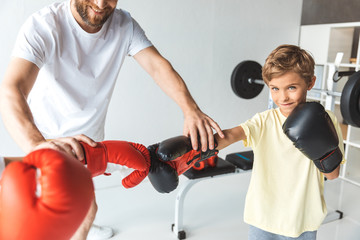 Wall Mural - trainer and boys in boxing gloves