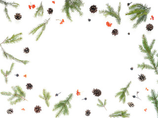 Wall Mural - Pattern of Christmas tree branches, cones on white background, top view. New Year, christmas background, frame. Flat design.
