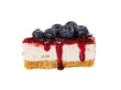 Piece of cheesecake with jam and fresh blueberries