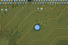 Close-up Of Electronic Circuit Golden Board Background Of Computer Motherboard