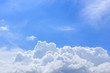 blue sky background with puffy white cloud