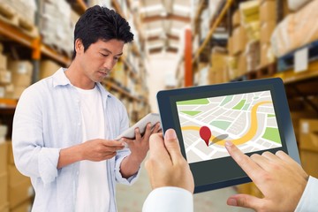 Poster - Composite image of man using tablet pc