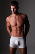 © forma82 - Young well build man is posing in white underpants.
