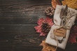 Thanksgiving decoration with cutlery and napkin on the wooden table, top view. Copy space