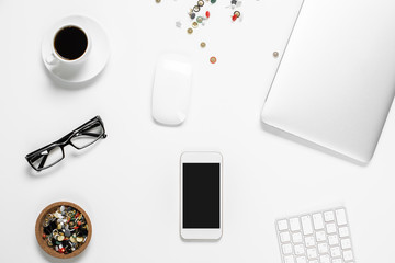 Poster - Office desktop with cellular phone closeup
