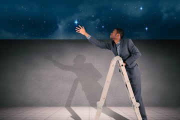 Poster - Composite image of businessman climbing up ladder