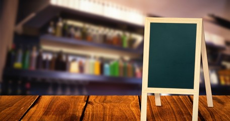 Poster - Composite image of bottles arranged in a shelf 