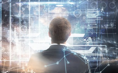 Poster - composite image of businessman looking up in suit