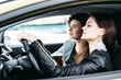 © speed300 - Two girls are riding in a car