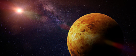 Wall Mural - planet venus in front of a colourful star field