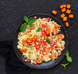 Wall Mural - Salad with bulgur and baked pumpkin.