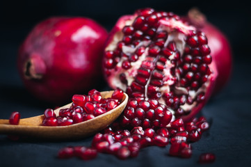 fresh pomegranate on a black background