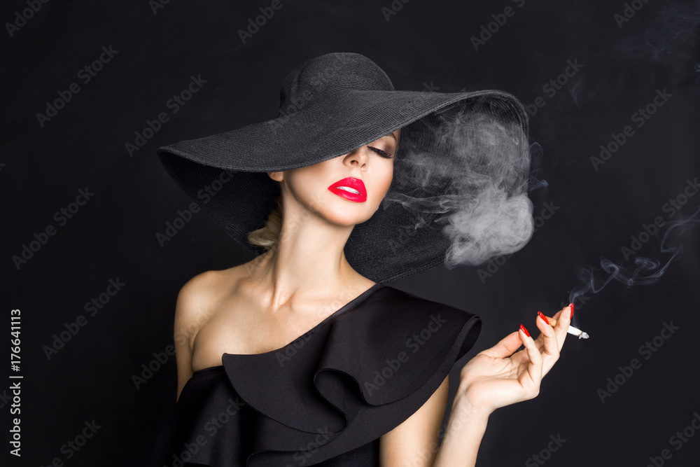 cigarette femme Elegant Woman, Fatale in Black Hat with in Hand Stock Image La Femme la cigarette