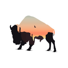 Wall Mural - Silhouette of buffalo with western rocks.