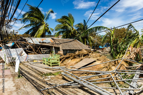Fotomural Wooden buildings completely destroyed by the passage of a major hurricane / supe