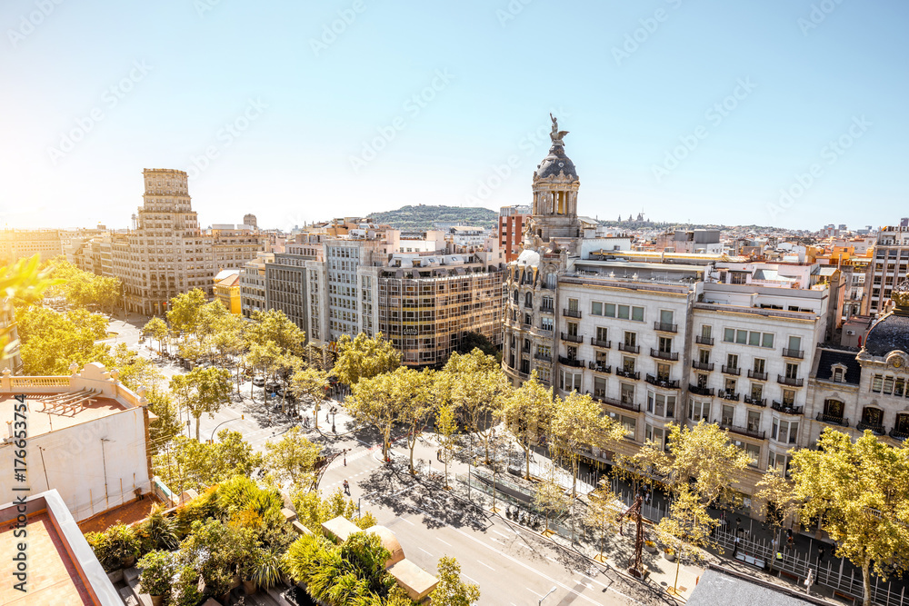 Top view on Gracia avenue with luxurious buildings in Barcelona city - obrazy, fototapety, plakaty 