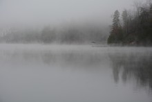 Fog On Mountain Lake