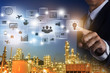 © Love You Stock - Business man working with modern virtual technology and pressing Big data analytics and business intelligence (BI). Businessman Pressing Virtual icons with Oil refinery double exposure.