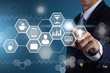 © Love You Stock - Big data analytics and business intelligence (BI) concept. Businessman Pressing Virtual icons on a digital screen interface background.