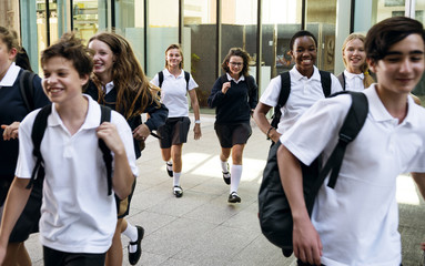 Wall Mural - group of students running at school