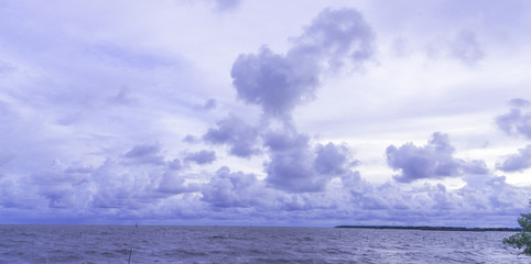 Wall Mural - evening beautiful sea under white cloud, soft color concept.