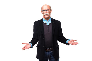 Senior man shrugging with raised hands on white background