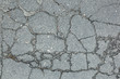A dark crack on the background of a rocky surface.