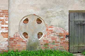 A cross with the inscription on the wall to Znamensky Cathedral. Veliky Novgorod, Russia