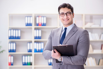 Poster - Young businessman working in the office