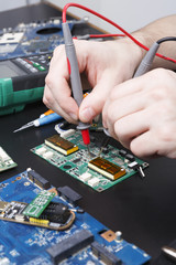 Poster - Electronic circuit board inspecting close up