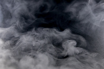 Wall Mural - White smokes with black background